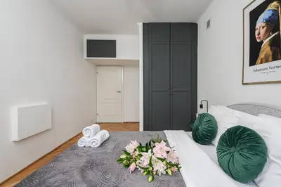 Łóżko lub łóżka w pokoju w obiekcie Lumina 3 room apart near Łazienki Królewskie