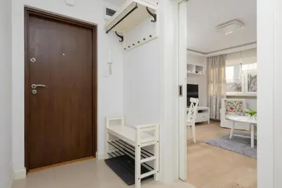 Kuchnia lub aneks kuchenny w obiekcie Cozy and Family Apartment close to the Metro in Warsaw by Noclegi Renters