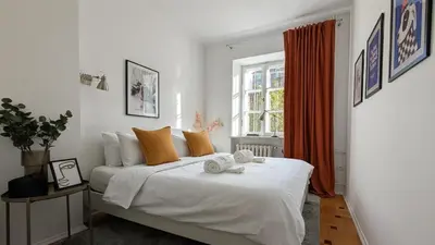 Łóżko lub łóżka w pokoju w obiekcie Bella Luna Luxury Suites - Chic Old Town Warsaw Apartment