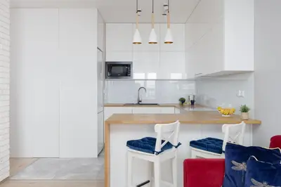 Kuchnia lub aneks kuchenny w obiekcie Cozy Apartment for 8 People with Air Conditioning and 2 Parking Spaces by Noclegi Renters