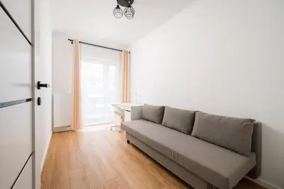Część wypoczynkowa w obiekcie Praga Południe Homely Apartment by BookingHost