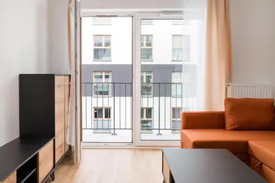 Telewizja i/lub zestaw kina domowego w obiekcie Praga Południe Homely Apartment by BookingHost