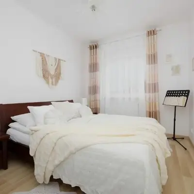 Cosy One-Bedroom Apartment with Parking & Balcony by Noclegi Renters