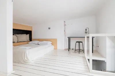 Łóżko lub łóżka w pokoju w obiekcie RentPlanet - Apartament Krucza