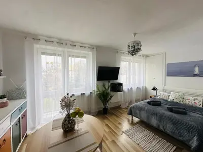 Łóżko lub łóżka w pokoju w obiekcie Ciasna Old Town Apartment