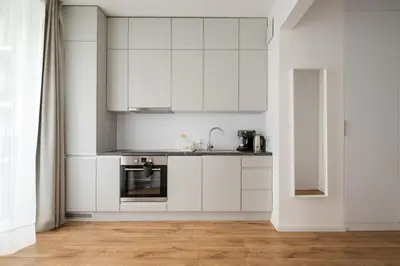 Kuchnia lub aneks kuchenny w obiekcie Browary Warszawskie Superior Apartment by BookingHost