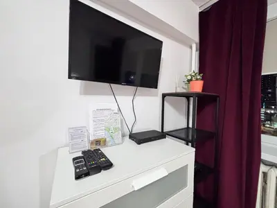 Telewizja i/lub zestaw kina domowego w obiekcie Elegant Apartment Warsaw Panorama