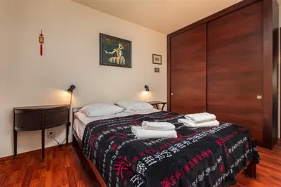 Łóżko lub łóżka w pokoju w obiekcie Broniewskiego 9E by Homeprime