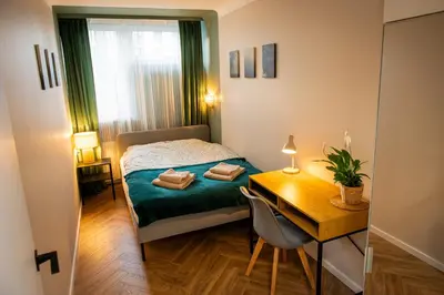 Łóżko lub łóżka w pokoju w obiekcie Graniczna City Loft