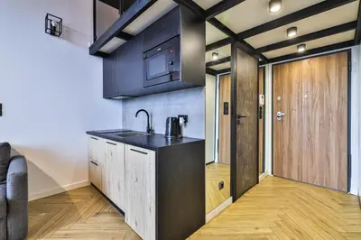 Kuchnia lub aneks kuchenny w obiekcie Prymasa Tysiaclecia 83A LOFT APT By Perfect Apart