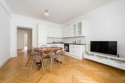 Kuchnia lub aneks kuchenny w obiekcie Powiśle Riverside Apartment by BookingHost