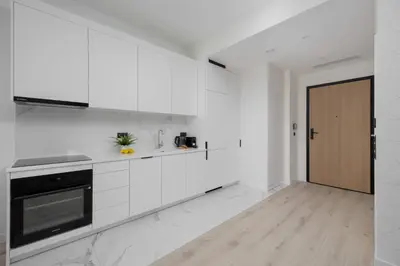 Kuchnia lub aneks kuchenny w obiekcie Towarowa Towers Studio with Free Gym Access and Balcony by Noclegi Renters