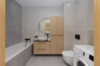 Łazienka w obiekcie Stylish Apartment Habicha with Air Conditioning and Underground Parking by Noclegi Renters