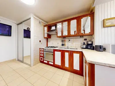 Kuchnia lub aneks kuchenny w obiekcie Cozy Stay Mokotow Apartment With Balcony