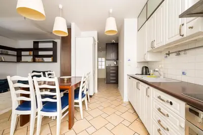 Kuchnia lub aneks kuchenny w obiekcie Ursynów Serenity Apartment by BookingHost