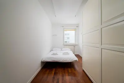 Łóżko lub łóżka w pokoju w obiekcie Ursynów Serenity Apartment by BookingHost