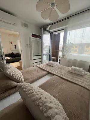 Łóżko lub łóżka w pokoju w obiekcie SPV Rentals Pileckiego 59 lokal 258 Ursynów