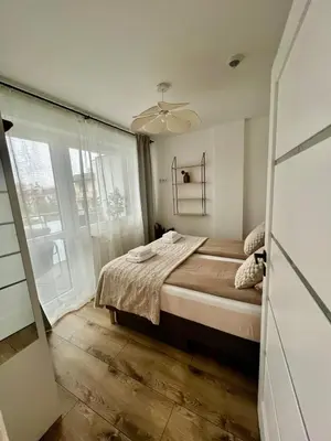 Łóżko lub łóżka w pokoju w obiekcie SPV Rentals Pileckiego 59 lokal 258 Ursynów