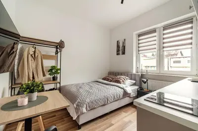 Łóżko lub łóżka w pokoju w obiekcie Bemovia House
