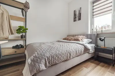 Łóżko lub łóżka w pokoju w obiekcie Bemovia House