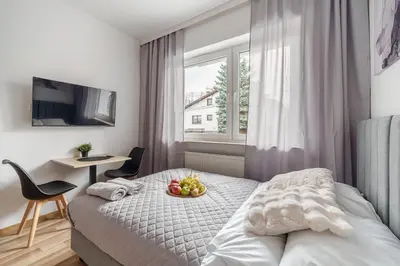 Łóżko lub łóżka w pokoju w obiekcie Bemovia House