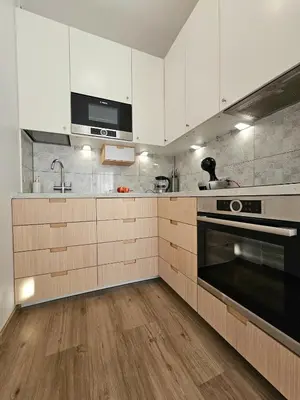 Kuchnia lub aneks kuchenny w obiekcie Super apartment new building parking Wola-Centrum