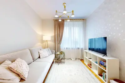 Telewizja i/lub zestaw kina domowego w obiekcie Moss Apartment Lazienki Park