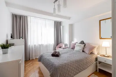 Łóżko lub łóżka w pokoju w obiekcie Close-Urban Chic - One-Bedroom near POLIN Museum, Anielewicza