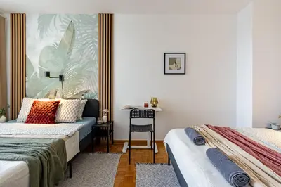Łóżko lub łóżka w pokoju w obiekcie Majdańska Apartment Warsaw by Mia