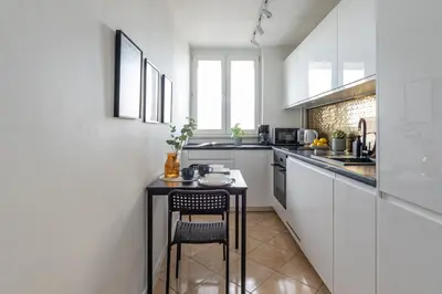 Kuchnia lub aneks kuchenny w obiekcie Majdańska Apartment Warsaw by Mia