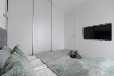 Łóżko lub łóżka w pokoju w obiekcie Urban Apartaments - Great Location - City Center - Siedmiogrodzka 3