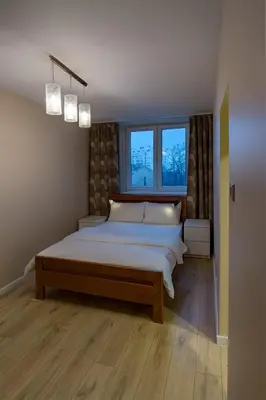 Łóżko lub łóżka w pokoju w obiekcie Urban Vista