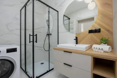 Łazienka w obiekcie Pastel Apartment in Warsaw with Garden, Parking and Desk for Remote Work by Noclegi Renters