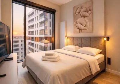 Łóżko lub łóżka w pokoju w obiekcie Towarowa Square Residence
