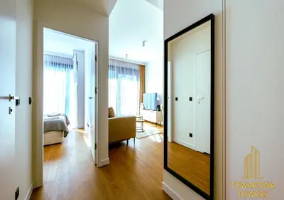 Łóżko lub łóżka w pokoju w obiekcie Towarowa Square Residence