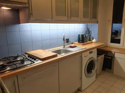 Kuchnia lub aneks kuchenny w obiekcie Wolność Centrum Apartament 2 poziomowy