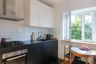 Kuchnia lub aneks kuchenny w obiekcie Muranów Apartment