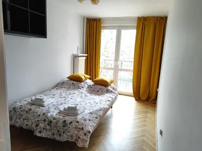 Łóżko lub łóżka w pokoju w obiekcie Family Apartment Just 4 you