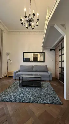 Łóżko lub łóżka w pokoju w obiekcie Kamienica Śródmieście Apartament 19A