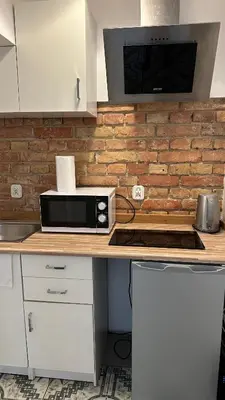 Kuchnia lub aneks kuchenny w obiekcie Kamienica Śródmieście Apartament 19A