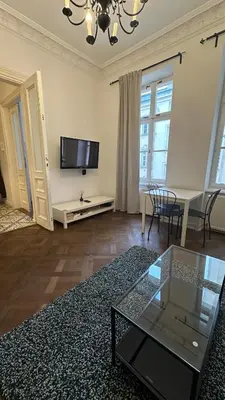 Telewizja i/lub zestaw kina domowego w obiekcie Kamienica Śródmieście Apartament 19A