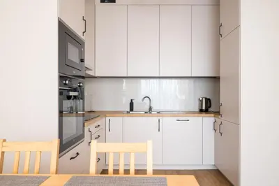 Kuchnia lub aneks kuchenny w obiekcie Bemowo Pleasant Apartment by BookingHost