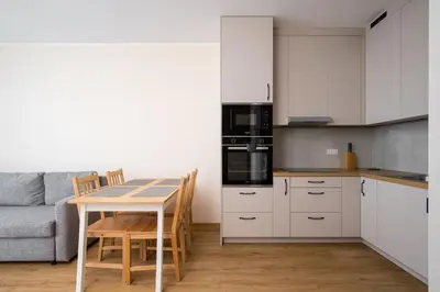 Kuchnia lub aneks kuchenny w obiekcie Bemowo Pleasant Apartment by BookingHost