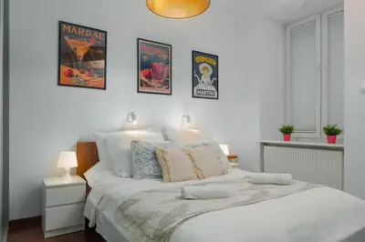 Łóżko lub łóżka w pokoju w obiekcie LYNA Home Gold - Light Residence