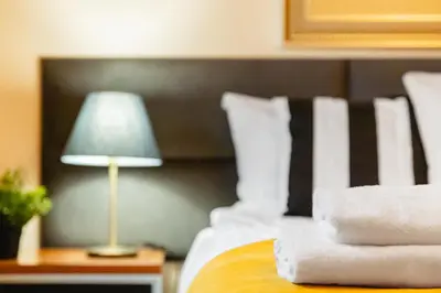Łóżko lub łóżka w pokoju w obiekcie Nowy Świat Quiet Apartment