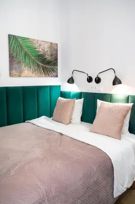 Łóżko lub łóżka w pokoju w obiekcie Urban Chic - Cozy Studio - Praga - Ząbkowska B