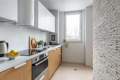 Kuchnia lub aneks kuchenny w obiekcie Łazienki Park Two-Bedroom Apartment with Balcony by Mia