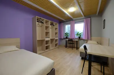 Łóżko lub łóżka w pokoju w obiekcie Apartamenty blisko Centrum - Trakt Lubelski 11, Warszawa