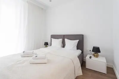 Łóżko lub łóżka w pokoju w obiekcie Urban Apartaments - Great Location - City Center - Wronia A