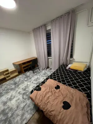 Łóżko lub łóżka w pokoju w obiekcie Stayo Apartments - Warsaw city center